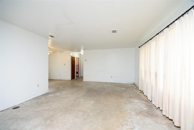 empty room featuring concrete floors