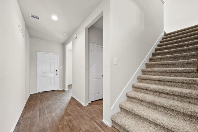 foyer featuring hardwood / wood-style floors