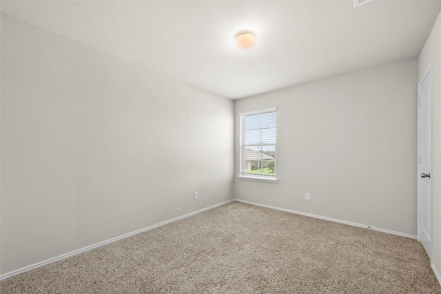 empty room featuring carpet