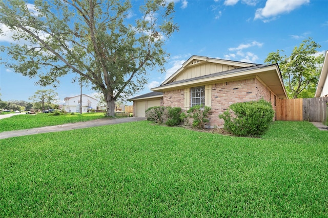 view of property exterior with a yard and a garage