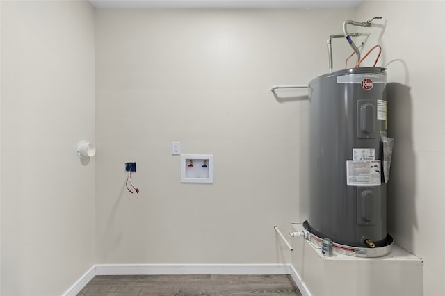 utility room featuring electric water heater