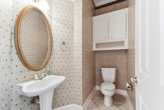 bathroom featuring tile patterned floors and toilet