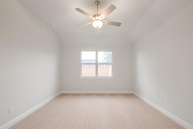 unfurnished room featuring ceiling fan and carpet