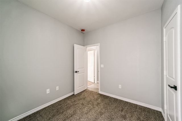 unfurnished bedroom with carpet flooring