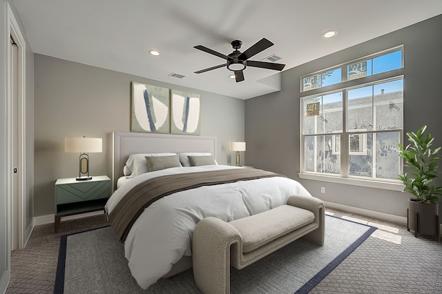 carpeted bedroom featuring ceiling fan