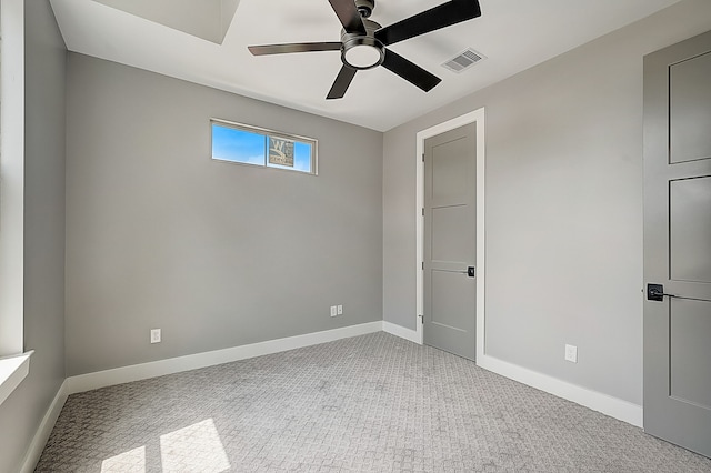 unfurnished bedroom featuring carpet and ceiling fan