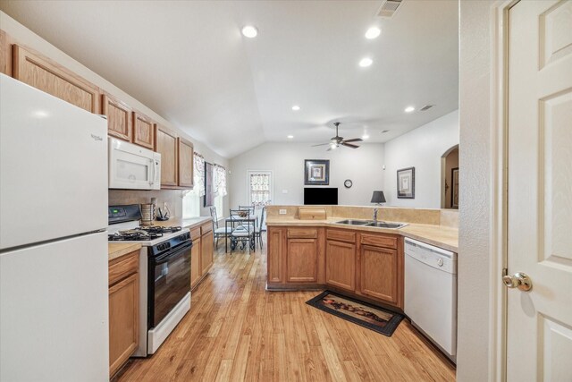 kitchen with light hardwood / wood-style flooring, lofted ceiling, ceiling fan, white appliances, and sink