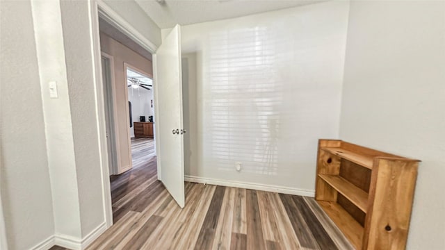 hall featuring hardwood / wood-style flooring