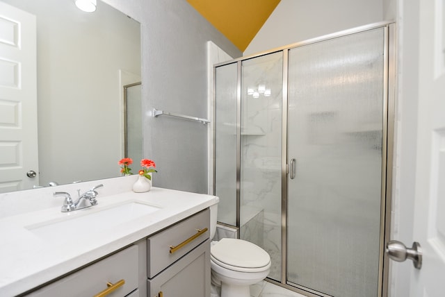 bathroom featuring a shower with shower door, toilet, tile patterned flooring, vanity, and vaulted ceiling