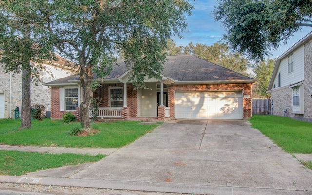 ranch-style home with a front yard and a garage