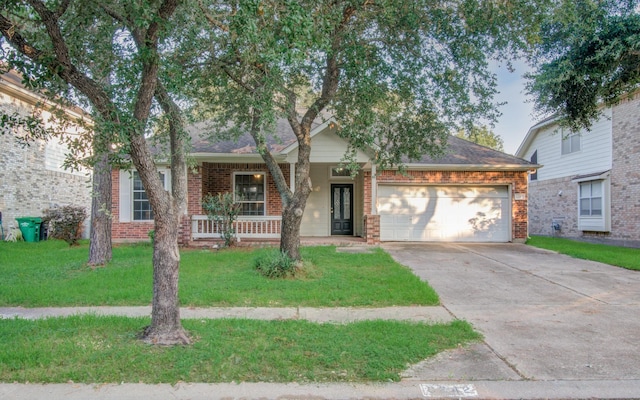 view of front of property with a garage, a porch, and a front lawn