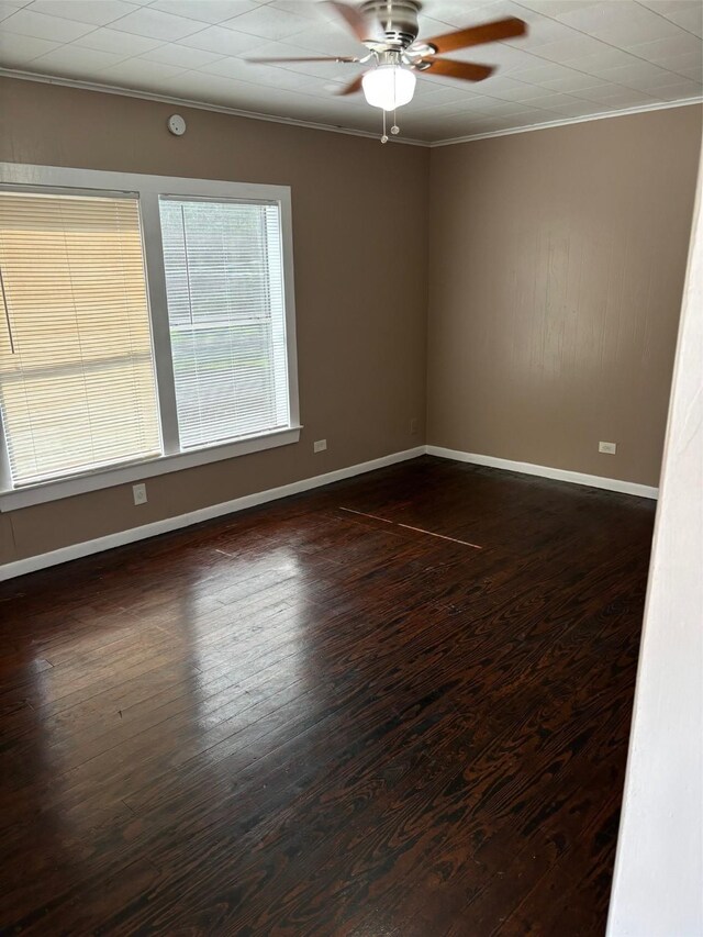 unfurnished room featuring ceiling fan, crown molding, and hardwood / wood-style flooring