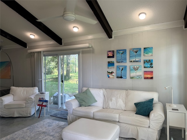 carpeted living room with beam ceiling and ceiling fan