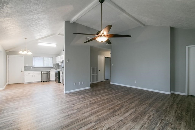 unfurnished living room featuring beam ceiling, ceiling fan with notable chandelier, and light hardwood / wood-style flooring