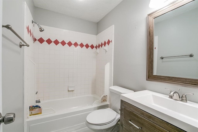 full bathroom with a textured ceiling, tiled shower / bath combo, vanity, and toilet