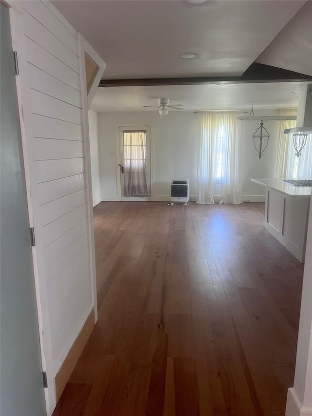 unfurnished living room with hardwood / wood-style floors and ceiling fan