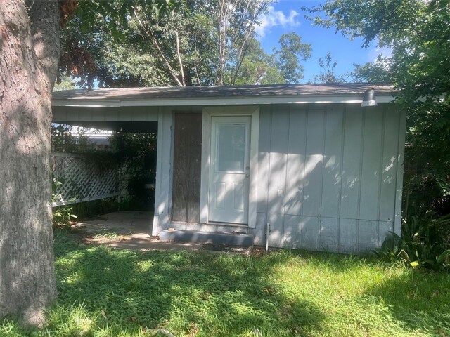 view of property exterior featuring a shed