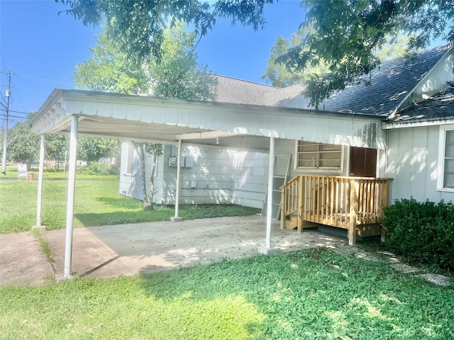 rear view of house with a yard