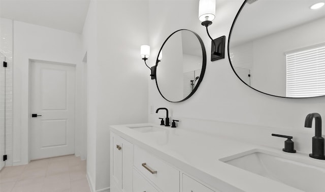 bathroom featuring vanity and tile patterned flooring