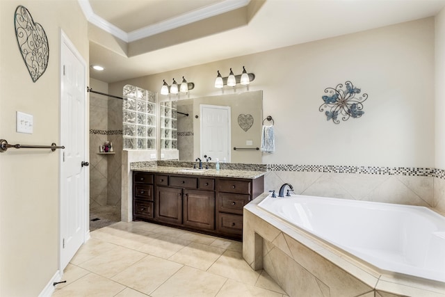 bathroom featuring shower with separate bathtub, ornamental molding, tile patterned floors, and vanity