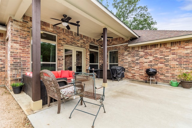 view of patio / terrace featuring grilling area, ceiling fan, and an outdoor living space