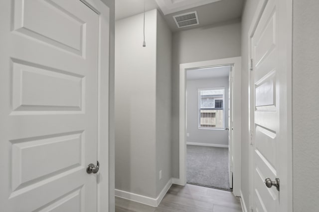 hall featuring light wood-type flooring