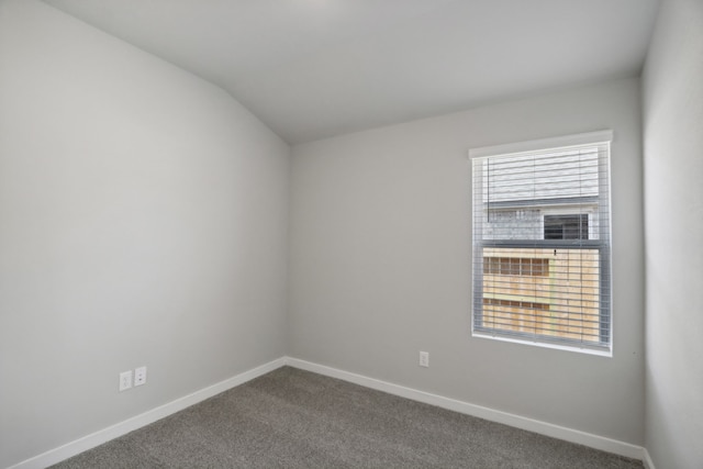 unfurnished room featuring carpet flooring