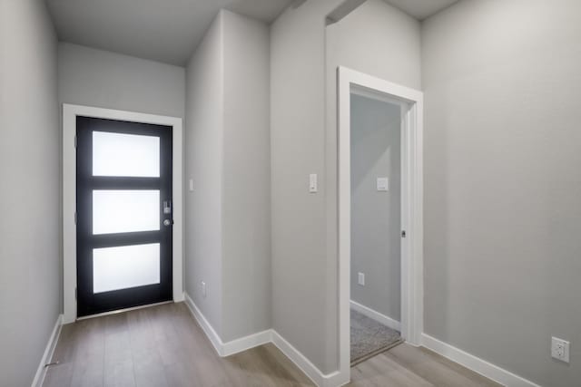 entryway with light hardwood / wood-style flooring