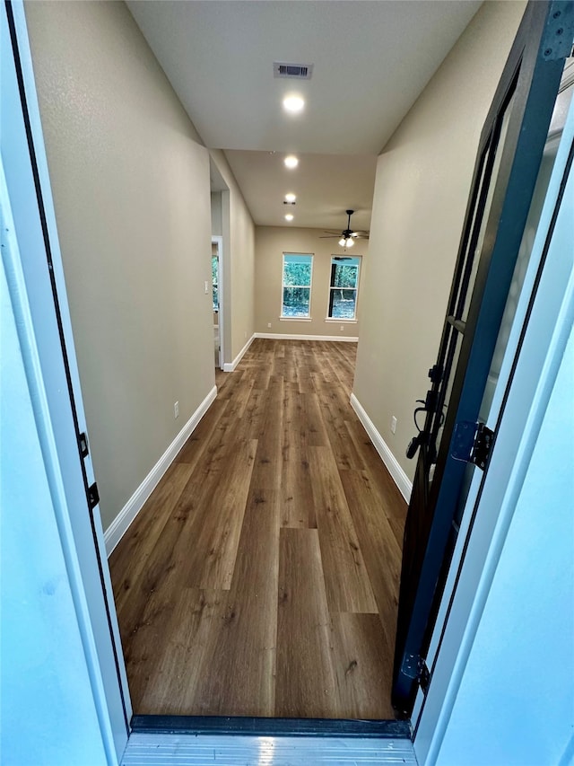 corridor featuring hardwood / wood-style flooring