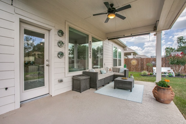 view of patio / terrace featuring ceiling fan and an outdoor living space