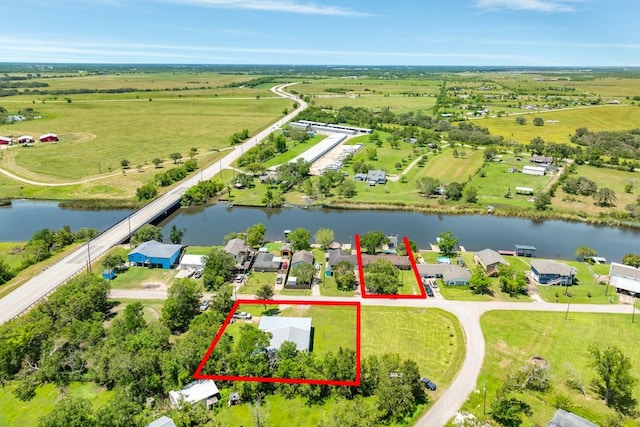 131 Bastrop Bayou Dr, Angleton, TX 77515 - bird's eye view with a water view and a rural view