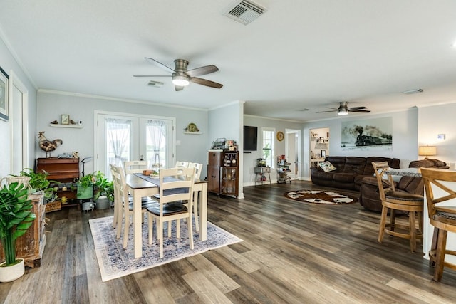 131 Bastrop Bayou Dr, Angleton, TX 77515 - dining space with visible vents, french doors, ceiling fan, and wood finished floors