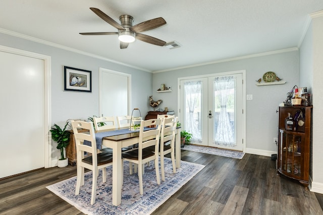 dining space with ceiling fan, dark wood-type flooring, french doors, and ornamental molding