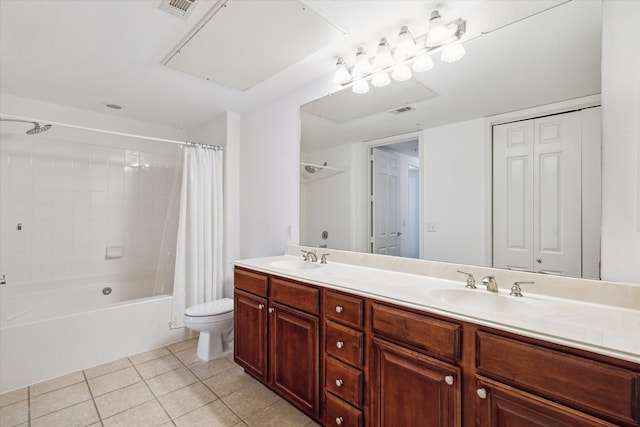 full bathroom featuring tile patterned flooring, vanity, shower / bath combo, and toilet