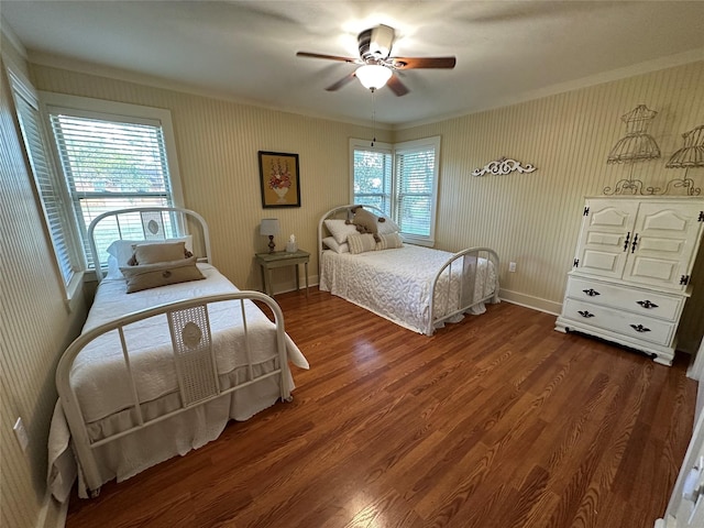 bedroom featuring ceiling fan and dark hardwood / wood-style floors