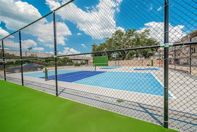 exterior space with tennis court