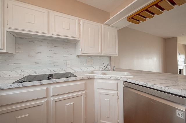 kitchen with dishwasher, black electric cooktop, white cabinetry, and sink