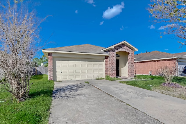 single story home with a front lawn and a garage