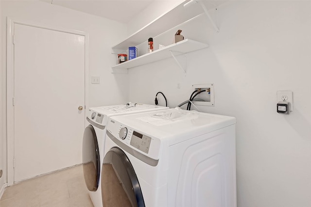 laundry area with independent washer and dryer