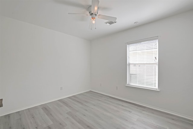 unfurnished room with ceiling fan and light hardwood / wood-style floors