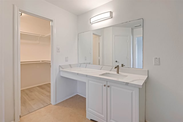 bathroom featuring hardwood / wood-style floors and vanity