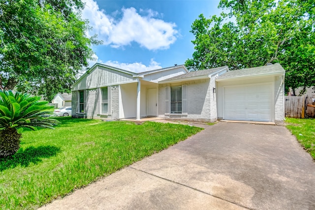 ranch-style home with a garage and a front yard