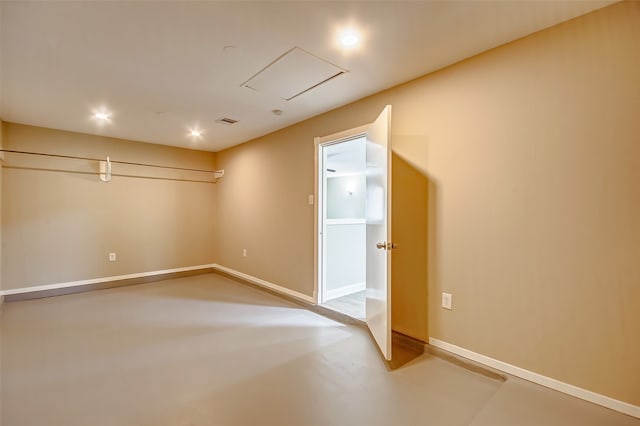 empty room featuring concrete flooring