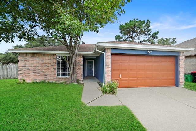 ranch-style house with a front yard and a garage