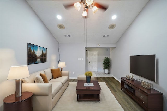 living room with ceiling fan and wood-type flooring