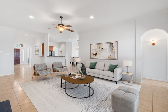 tiled living room featuring ceiling fan