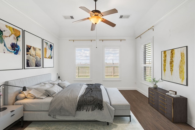 bedroom featuring ceiling fan and dark hardwood / wood-style floors