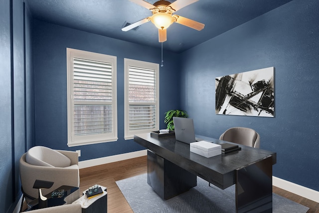 office featuring wood-type flooring and ceiling fan