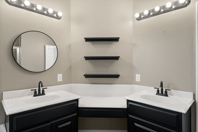 bathroom featuring double vanity