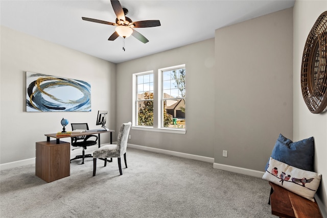 office area with carpet and ceiling fan